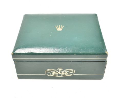 A vintage 20th-century green leather gilt tooled wristwatch presentation case with hinge top. Crown logo atop. Measures 11.5c
