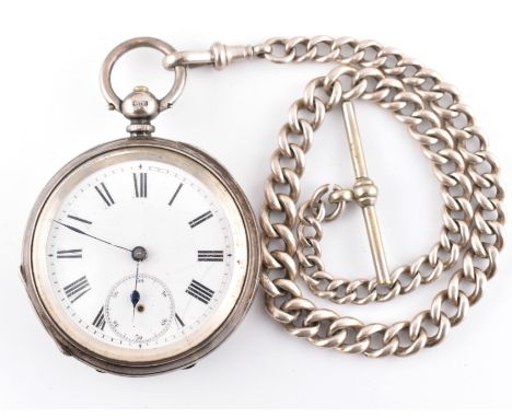 A Victorian hallmarked silver pocket watch and Albert chain with T-bar. The silver pocket watch having a glass case to front 
