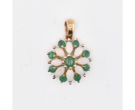 A 9ct gold opal and emerald floral cluster pendant. Weight 1.21g. Marked 9K. All weights, measurements and sizes are approxim