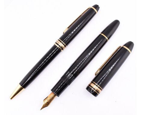 A Mont Blanc No 146 18ct gold nib fountain pen together with a Mont Blanc twist roller ball pen. All weights, measurements an