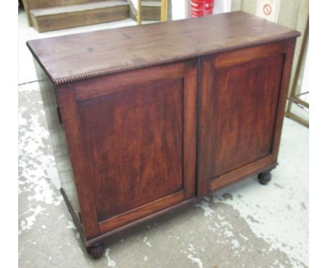 SIDE CABINET, George IV mahogany having beaded detail with a pair of panelled cupboard doors below enclosing a shelf, 102cm W