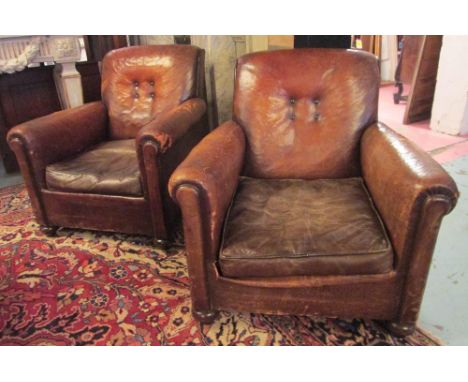 CLUB ARMCHAIRS, a pair, Art Deco with seat cushions in distressed brown leather, each 76cm W x 75cm D x 80cm H. (2) ( with fa