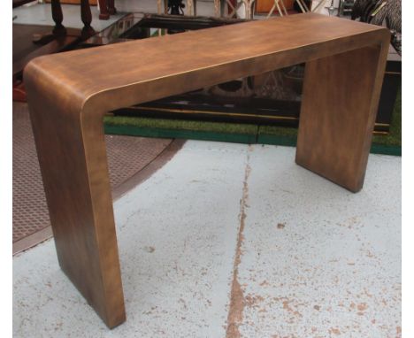 CONSOLE TABLE, in a gold finish of curved form, 81cm H x 135cm W. 