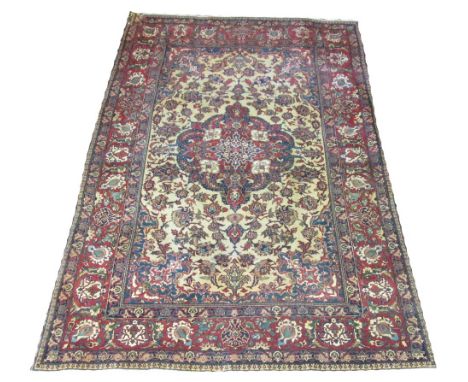 EXTREMELY FINE ISPHAHAN CARPET, 213cm x 145cm, central medallion on an ivory field with scrolling vines and palmettes within 