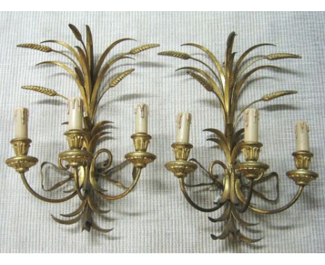 WALL LIGHTS, a pair, gilt metal, wheatsheaf design, each with three lighting arms, approximately 51cm H x 36cm W. (2)