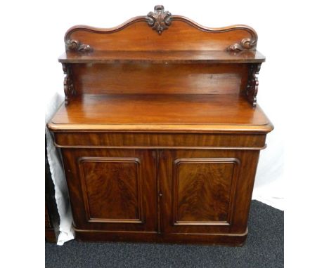 VICTORIAN MAHOGANY CHIFFONIER
the shaped raised back with a shelf supported by pierced scrolls above a frieze drawer with a p