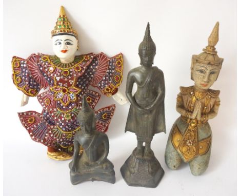 THAI CARVED WOOD PUPPET 
in traditional costume, 36cm high; a carved woman kneeling with her hands clasped, 32cm high; and tw