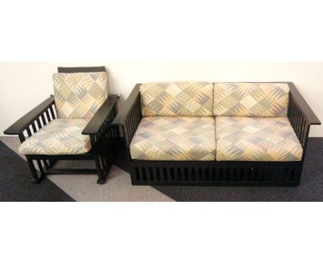 HABITAT EBONISED ARMCHAIR
with a reclining back together with a matching two seat sofa, both with open slatted backs and side