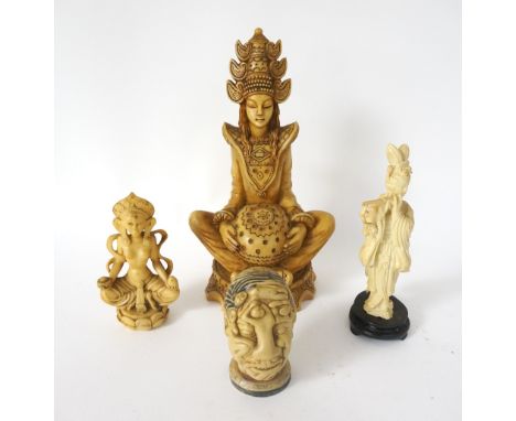 HINDU GODDESS 
seated cross legged on a decorative plinth, 26.5cm high; an East Asian deity sat on a lotus leap plinth, 13.5c
