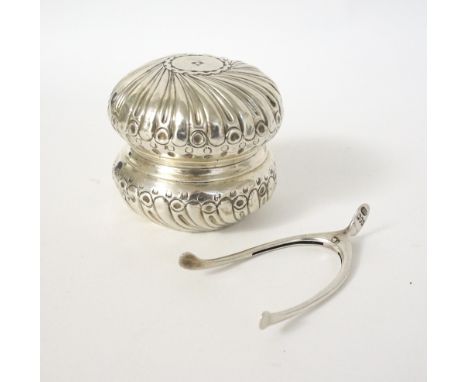 VICTORIAN SILVER CIRCULAR TRINKET BOX AND COVER
with embossed decoration, London hallmarks for 1886; together with a pair of 