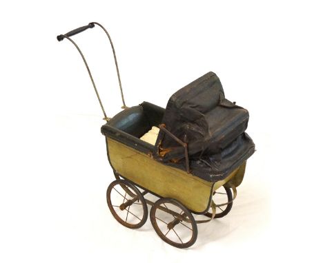 VINTAGE DOLL'S PRAM
early 20th century, the wooden body with shaped metal frame support structure, leather effect folding hoo