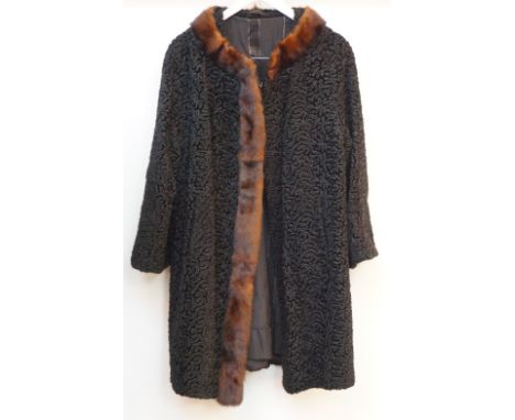 VINTAGE LADY'S ASTRAKHAN EVENING COAT
with mink collar and trim, with pockets and labelled 'Astra Furs Paris'