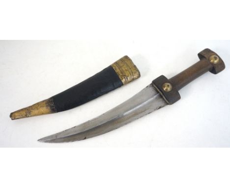 KURDISH JAMBIYA
early 20th century, with brass studded carved horn hilt, curved double-edged blade with medial ridge, and bra