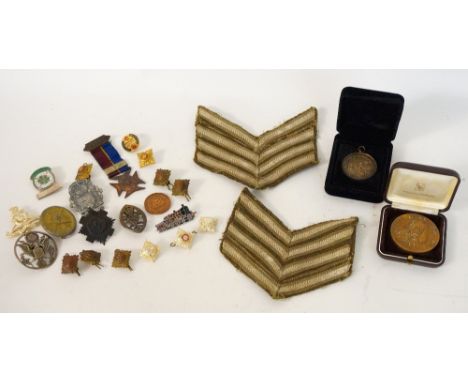 SMALL COLLECTION OF MEDALS AND BADGES
including a Church Lads Brigade medal with '1912' clasp, Queen's Institute of District 