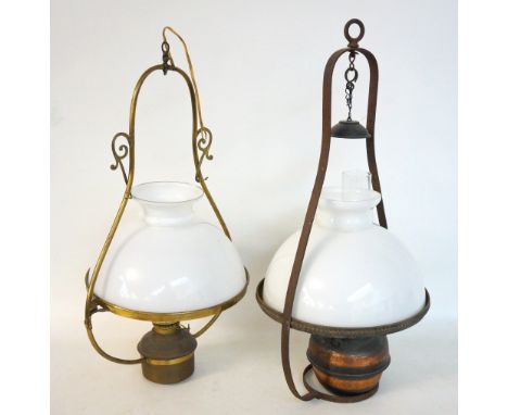 SHAPED HANGING OIL LAMP
the steel frame with a hanging smoke catcher hood, above a clear glass chimney and opaque glass shade