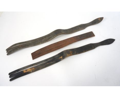 THREE VINTAGE LEATHER TAWSE
two marked 'J.G. Stevenson Glasgow', each with three tongues in black leather, 61cm long, one in 