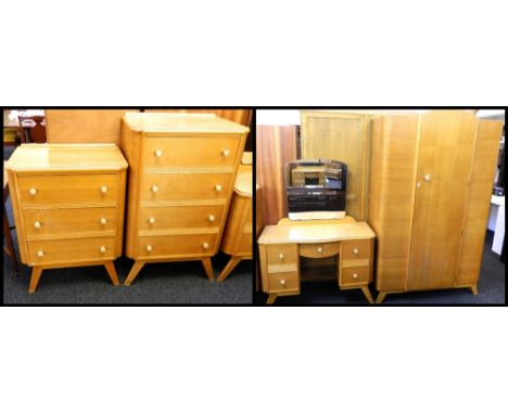 WOODLAND LIGHT OAK BEDROOM SUITE
comprising a wardrobe, a chest of four drawers, a chest of three drawers and a mirror back d