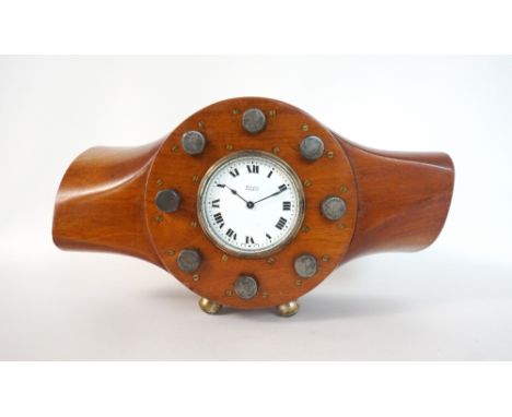MAHOGANY PROPELLOR CLOCK
early 20th century, the aeroplane propeller section with inset 'Buren' Swiss timepiece with black Ro