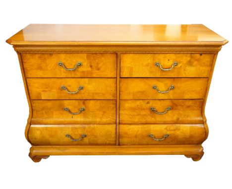 PULASKI AMERICAN LIGHT OAK DRESSING CHEST
the eight shaped drawers with metal rope twist handles, standing on bracket feet, 1