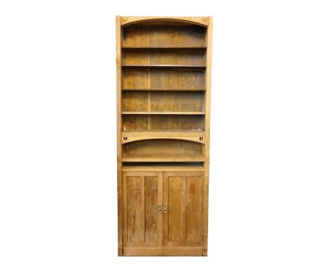 ARTS AND CRAFTS TALL OAK BOOKCASE
the shaped top with heart motifs above now lacking doors, with adjustable shelves, and a sh