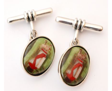 PAIR OF SILVER AND ENAMEL GOLFING INTEREST CUFFLINKS
the enamel panels depicting gold clubs in bags