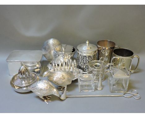 ##A Victorian silver plated nautilus spoon warmer, a pair of partridges, toast rack, lemon squeezer, etc