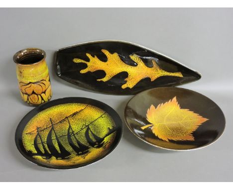 Four Poole Pottery Aegean items, two shape 4 dishes, one with leaf pattern, the other with sailing boats, 26.5cm diameter, a 