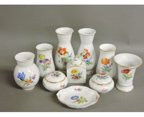 ##Twelve modern Meissen porcelain items, comprising two pairs of vases, a pair of lidded boxes, an oval dish, tea caddy, and 