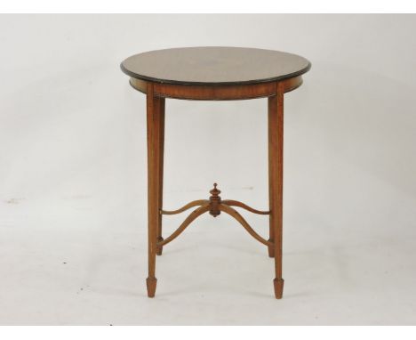 ##A Sheraton revival circular satinwood occasional table, with label for Taylor and Sons, 62cm diameter