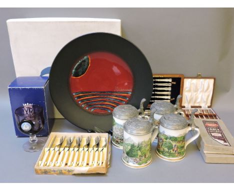 A large Poole pottery 'Millennium' charger, designed by Alan Clarke, No 820 of 2000, in original box with certificate, 41cm d