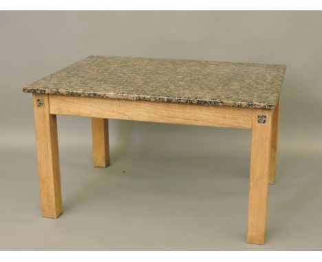 An unusual light oak table, with variegated marble top and marble squares set into the legs, 130cm wide, 95cm deep