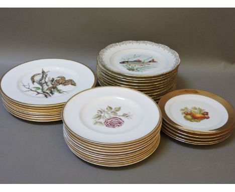 ##Twelve French porcelain fish plates, eleven Royal Worcester flower plates, eight Coalport and five fruit plates, 'British B
