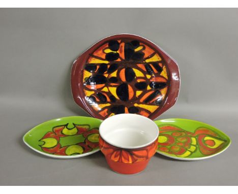Four Poole Pottery Delphis items, two lime green dishes, 31cm long, a plate pot, 11.5cm, and a dish, 34.5cm