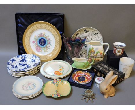 Two Clarice Cliff plates, painted with nasturtiums, two further Clarice Cliff plates, a Homemaker plate, and further ceramics