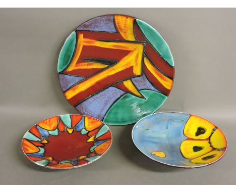 Three Poole Pottery Living Glaze dishes, by Lorna Whitmarsh and Carla Singleton, 26cm, 27cm and 37cm diameter
