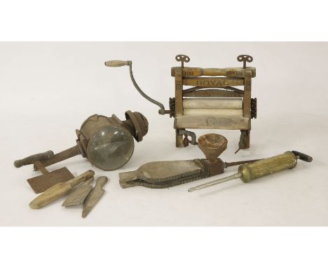 An American mangle, an iron and brass carriage lamp, bellows, kitchen tools, etc