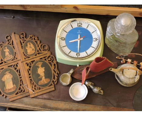 A large shop display perfume bottle, a pair of Sorrento ware panels, a Retro wall clock, a Retro lamp in the form of a sailin