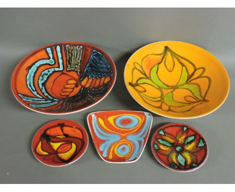 Two Poole Pottery Delphis shape 57 dishes, 26.5cm diameter, two shape 49 dishes, 12.5cm diameter, and a dish marked Wessex In