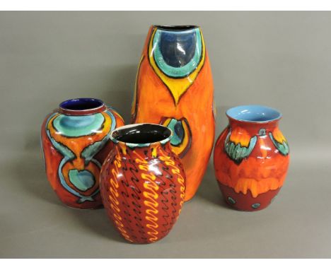 Three Poole Pottery Living Glaze vases, a peacock vase, designed by Anita Harris, 37cm high, and three further vases, 20cm an