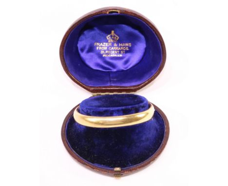 18ct gold hinge bangle by Frazer & Haws stamped 18 in original box approx 39.4gm    Condition Report   Click here for further