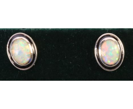 Pair of silver opal stud ear-rings stamped 925    Condition Report   Click here for further images, condition, auction times 