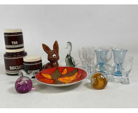 POOLE POTTERY; a 'Delphis' shape 4 dish, diameter 26.5cm, together with three 1980s glass storage jars, two glass models of b