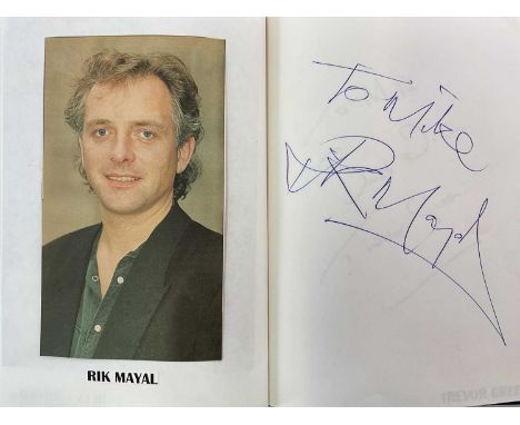 A blue autograph album containing seventy-five pages of various TV celebrities including Lee Evans, Rick Mayall, Oliver Reed,