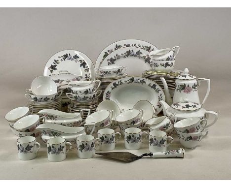 ROYAL WORCESTER; a large collection of dinner, tea and coffee wares in 'June Garland' pattern including various sized plates,