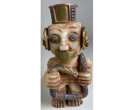 A large South American Inca inspired polished stone yellow metal mounted and lapis lazuli detailed figure holding a serpent w