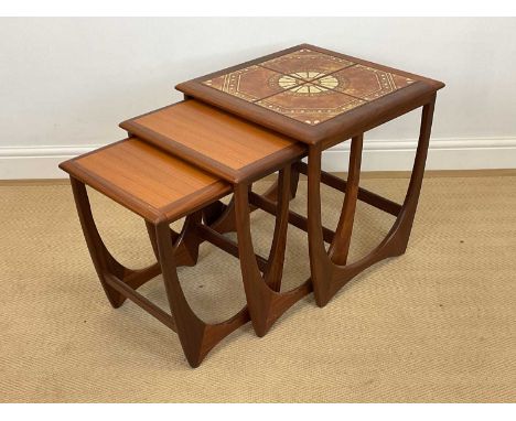 G PLAN; a nest of Fresco tables, the largest tile topped, height 52cm, width 50cm, depth 50cm.