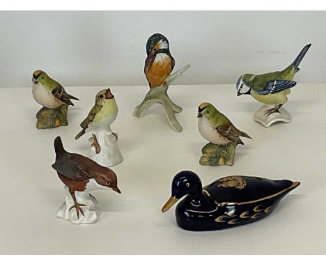 BESWICK, GOEBEL and LIMOGES; figures comprising various studies of birds and a duck, largest height 10cm (7).