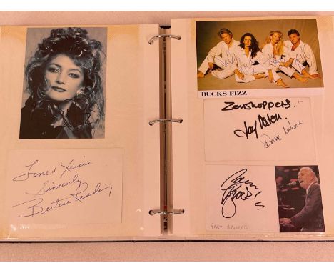 A ring binder containing approximately one hundred plus pages of colour photo images, ephemera and leaflet flyers with signat