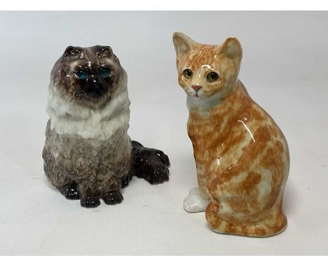 WINSTANLEY POTTERY; two cats in seated positions, height 31cm.