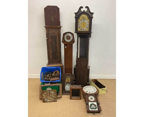 Two reproduction grandmother clocks (one af), also a case for a longcase clock, an associated dial, three wall clocks in need